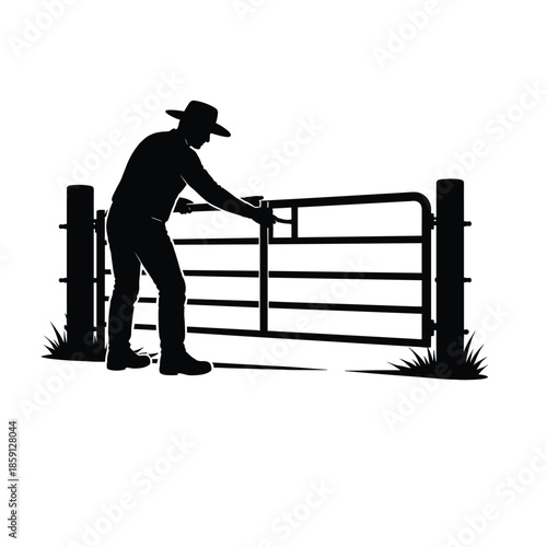 Silhouette of cowboy opening metal gate