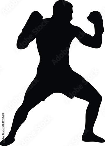 Aggressive male boxer adopts a powerful wide stance preparing for an intense sparring match