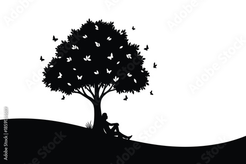 a silhouette of a tree with butterflies and a person sitting at its base against a white background