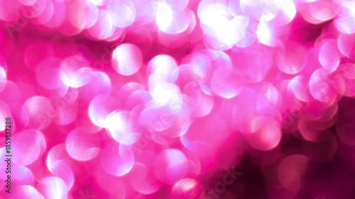 Pink bokeh background.Round pink and white bokeh glow. Iridescent wallpaper