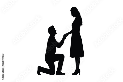 A romantic silhouette depicts a couple during a proposal with a man kneeling and offering a ring to a woman