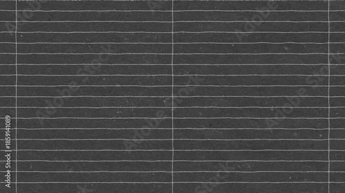 Textured dark paper notebook page with white lines illustrating writing surface for various purposes