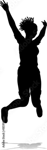 A happy woman jumping for joy in mid air silhouette person concept