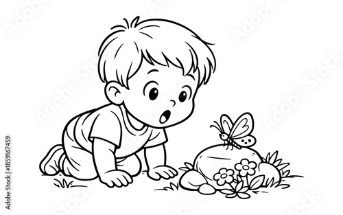 Surprised toddler boy crawling on the ground looking at a butterfly