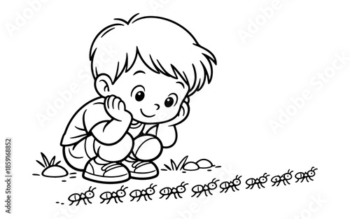 Curious young boy watches a line of ants marching across the ground