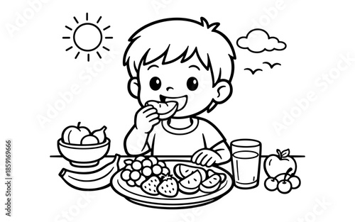 Happy child enjoying a healthy breakfast with fresh fruits and juice