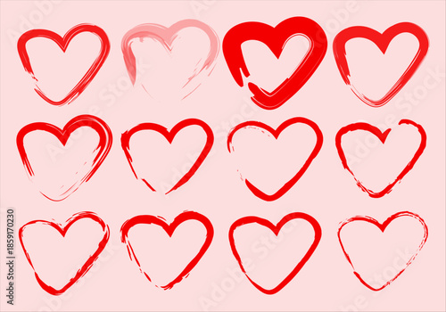 Conjunto de doce iconos de corazones rojos con trazos de estilo pincel sobre fondo rosa