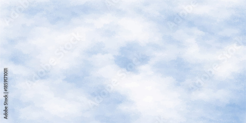 A beautiful clear blue sky with fluffy white clouds creates a natural summer cloudscape on a sunny day in the bright outdoor atmosphere