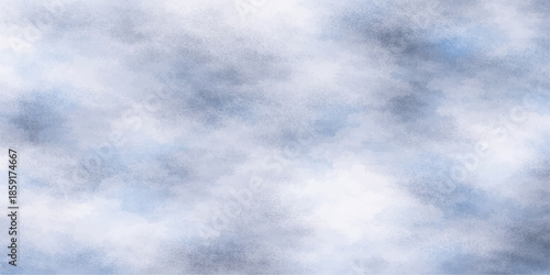 A beautiful summer day featuring white clouds drifting through a high blue sky atmosphere with bright light and a serene nature cloudscape