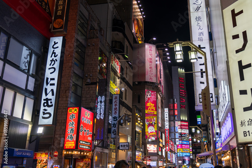 Kabukicho neon signs glowing in the night streets at Shinjuku, Tokyo