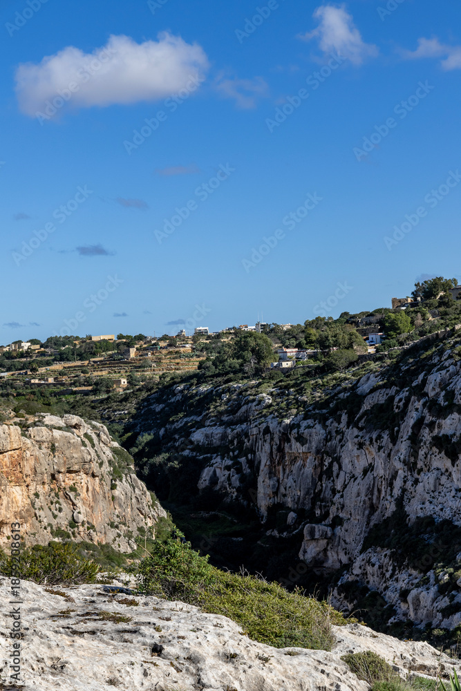 Naklejka premium Blue Grotto. Rocky coastline of Malta. Natural landscape