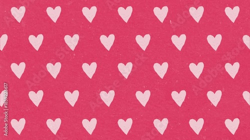 Valentine's day illustration with repeating white hearts over red textured surface