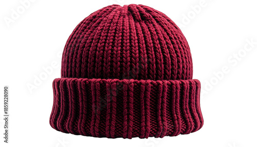 Close-up of a maroon-colored, knitted winter hat with a folded brim, isolated