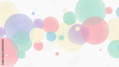 A colorful illustration of various sized spheres in pastel colors on a white background
