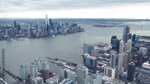 New York City aerial view from helicopter in slow motion. City skyline and Hudson River from Jersey City