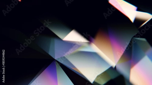 Abstract background overlay of dispersion of light through a prism creating a colorful iridescent effect. Seamless loop