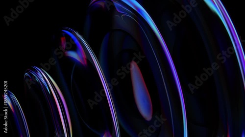 Abstract iridescent glass rings rippling with light dispersion and reflection on a black background. Seamless loop