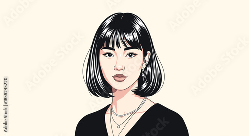 Portrait of a stylish young woman with straight black hair and bangs wearing a black top and several layered silver necklaces.