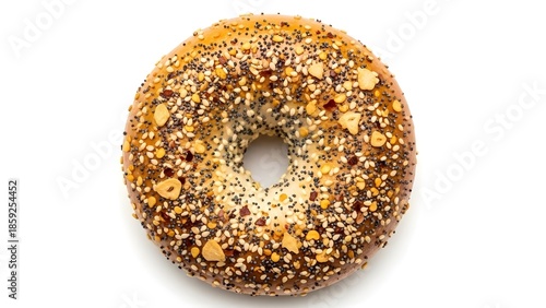 Delicious everything bagel with seeds and garlic on white background