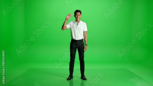 Man Standing in Front of Green Screen.