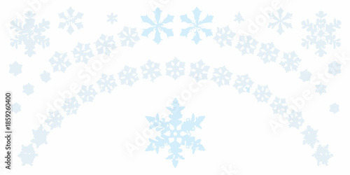 A delicate arc of pale blue snowflakes against a white background