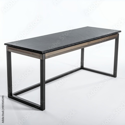 Minimalist desk with dark stone top in a clean white backdrop studio setting