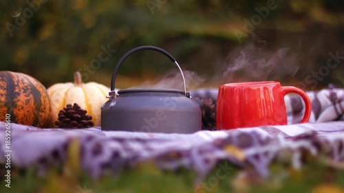 Steam from boiling hot water in camping kettle