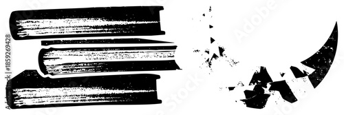 stacked books shattered by curved blade