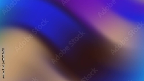 Blurry abstract background with purple, blue, and tan colors suitable for design projects, web graphics, and artistic concepts.
