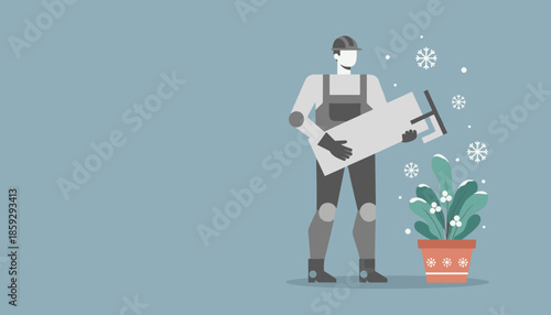 Worker holding material next to a potted plant with falling snowflakes Winter construction service