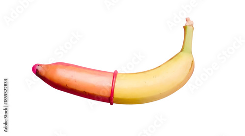 Yellow banana with a pink condom partially rolled over the tip for sexual health education isolated on transparent background