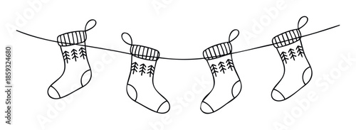 Festive winter stockings adorned with charming spruce tree patterns hanging on a decorative line, excellent for holiday marketing campaigns, seasonal event promotions, or cozy home decor