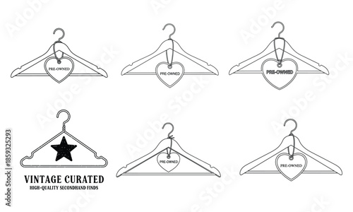 Collection of vintage clothing hangers with tags