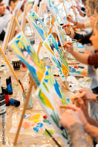 Women enjoying a creative sip and paint event