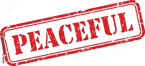 A detailed look at a red rectangular stamp displaying the word peaceful in bold uppercase lettering