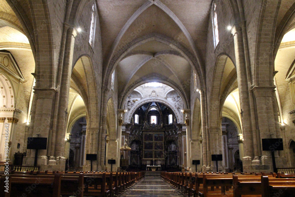 Fototapeta premium Interior of Valencia Cathedral with dome and altar, featuring historic Gothic and Baroque religious architecture, taken in July 2024.