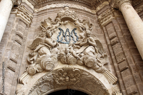 Statues of saints at Valencia Cathedral, highlighting historic religious sculpture and Gothic stone architecture, taken in July 2024.