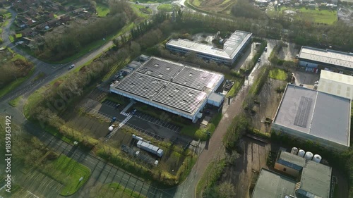 Aerial view of a data center in Milton Keynes, featuring buildings with solar panels and large parking lots, Milton Keynes, England, United Kingdom.
