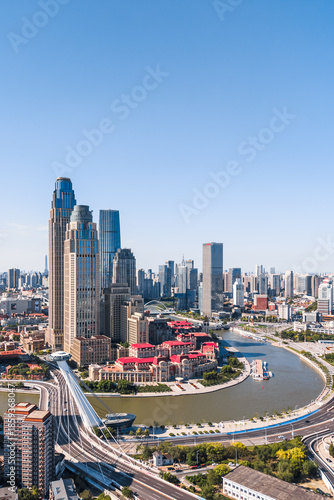 Bild auf Leinwand The skyline of Chifeng Bridge and Jinwan Square CBD in Tianjin, China