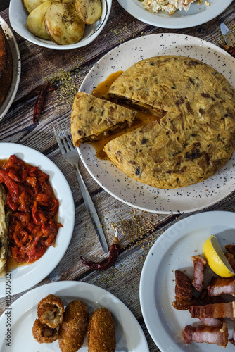 Spanish food spread showing tortilla de patatas and tapas