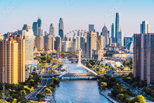 Foto High angle view of the city scenery and Tianjin Eye Ferris Wheel on the Haihe River in Tianjin, China