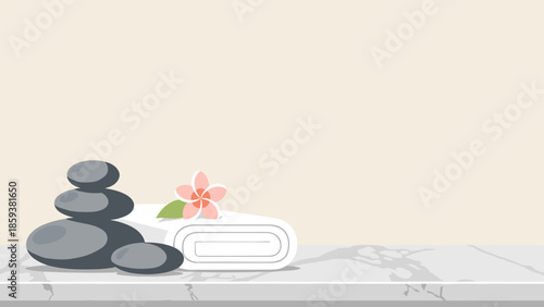 Stack of stones and a folded towel on a marble table with copy space