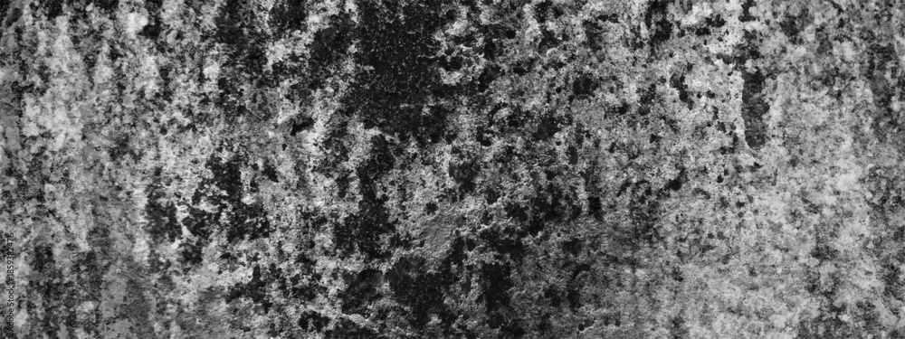Obraz premium Dark Rough Surface Texture Showing Signs of Wear and Decay