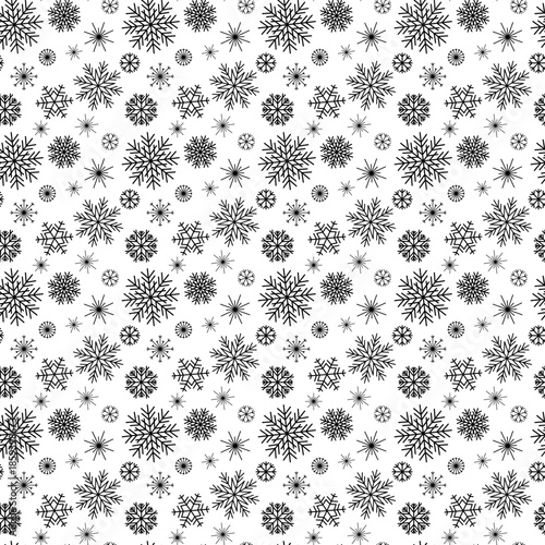 Seamless Christmas pattern with black snowflakes on a clean white background. Minimal winter holiday abstraction ideal for Christmas decor, New Year textile prints, wrapping paper, wallpaper and festi