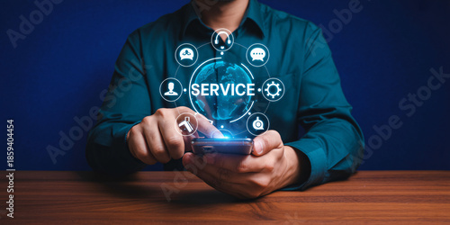 Man using smartphone with service icons and global network connection