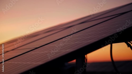 Solar Panels Reflecting The Golden Light Of A Beautiful Sunset.