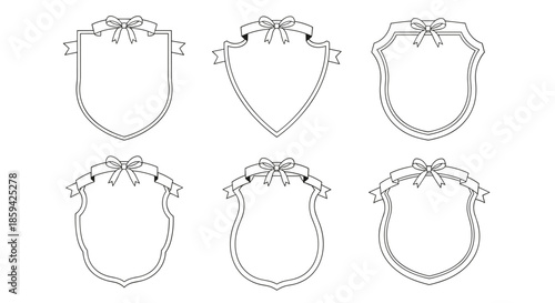 Six blank crest or shield shaped frames with a decorative ribbon and bow on top isolated on a white background.