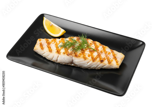 Grilled Fish Fillet with Lemon on Black Plate, Isolated