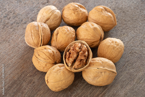 Premium walnuts on a wooden table.