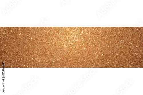 A close-up view of a textured golden surface with a glittery effect